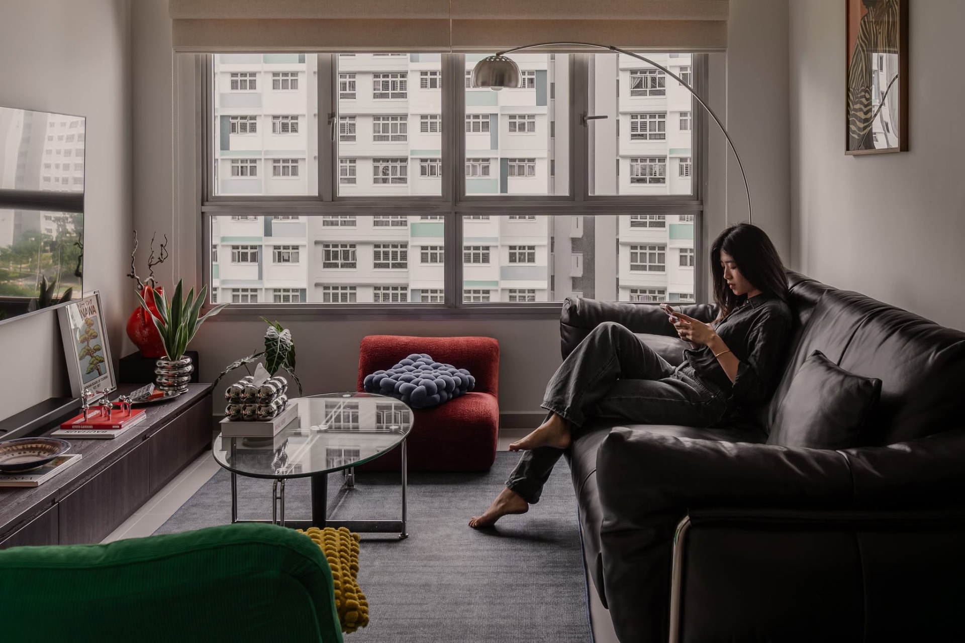 A quiet afternoon in a Quad.R Design home, soft daylight across the living room